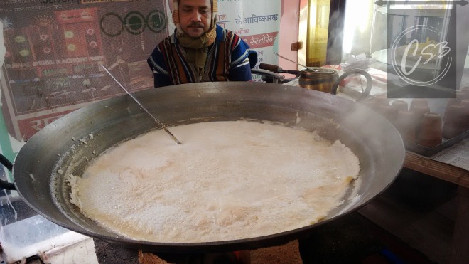 Flavoured milk being thickened and served malai maarke. 